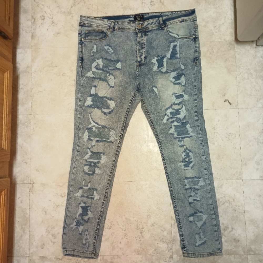 BooHoo Man ripped and repaired jeans